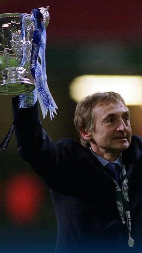 Tony Parkes holding a trophy