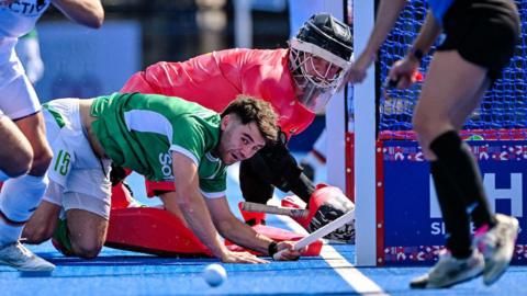 Ireland’s Kyle Marshall with a goalline clearance against Germany