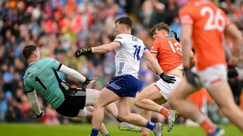 Oisin O'Neill scores