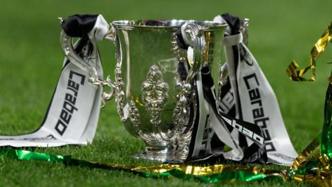 The trophy on the pitch after the Carabao Cup Final between Liverpool and Newcastle United at Wembley Stadium on March 16, 2025 