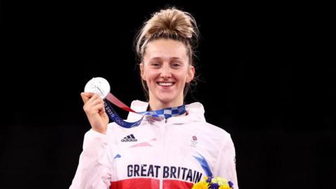 Lauren Williams poses with her silver medal at the Tokyo Olympics in 2021