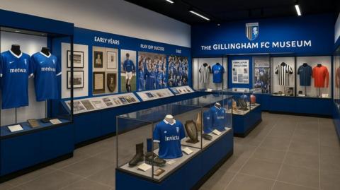 Artist's impression of a new Gillingham museum set to open at the stadium in the 2027/2028 season, with glass cases full of shirts, black and white photos, and memoribilia