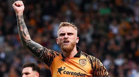 Oli McBurnie celebrates scoring the first of his two goals for Hull City.