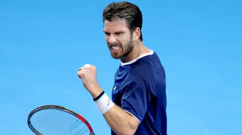 Cameron Norrie celebrates