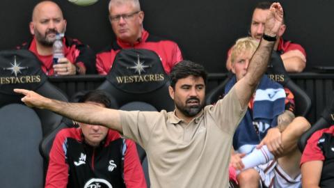 Vitor Matos signals on the touchline during Swansea's friendly against Leganes 