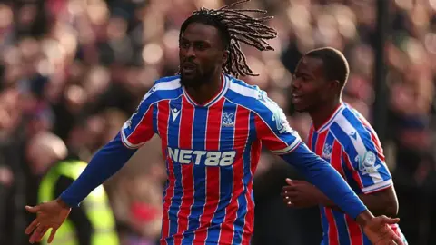 Evann Guessand celebrates scoring for Crystal Palace against Wolves