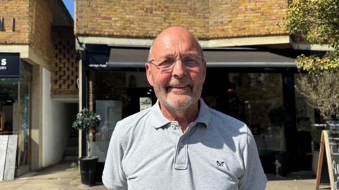 Paul Aubrey from Federation of Oxshott Residents and Associations looks straight at the camera