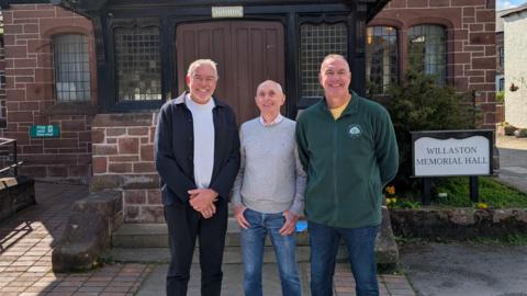 A view of Martin Townley, Paul Clegg and Tony Ashcroft standing in front of Willaston Memorial Hall