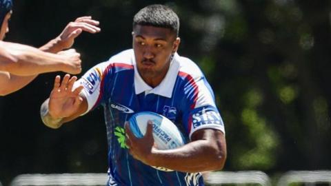 Terrell Peita carries the ball for Blues in a pre-season friendly