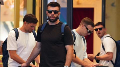 Scotland players John Souttar, Grant Hanley, Lewis Ferguson and Andy Robertson leave the team hotel