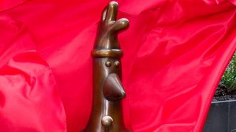 Bronze statue of Feathers McGraw