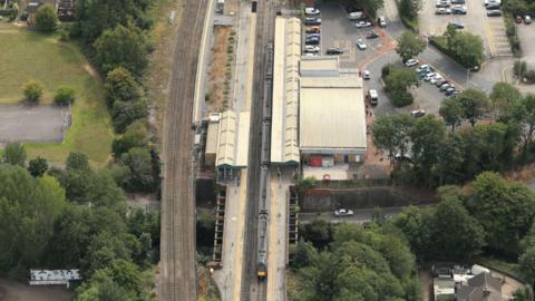 Bird's eye image of Chesterfield Railway Station with a track running through the middle