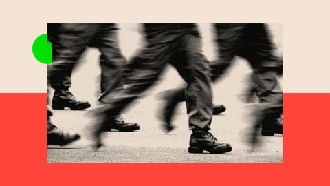 A treated image treated image of soldiers walking, with only their lower legs visible
