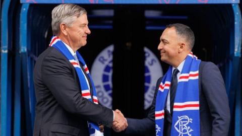 Andrew Cavenagh and Paraag Marathe address the media after their 'Extraordinary General Meeting', on 23 June, 2025, in Glasgow, Scotland.
