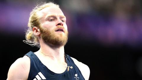 Jonnie Peacock reacts after a race in Paris