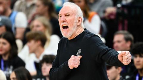 Gregg Popovich giving instructions courtside for the San Antonio Spurs 