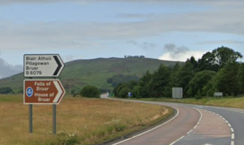 A stretch of road with two signs. One says Blair Atholl, Pitagowan, Bruar and B8079. The other says Falls of Bruar, House of Bruar.