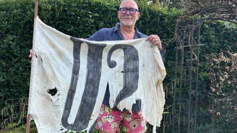 David Hancock with his U2 flag