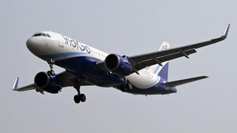 An Airbus SE A320 aircraft, operated by IndiGo, a unit of InterGlobe Aviation Ltd., prepares to land at Indira Gandhi International Airport in New Delhi, India, on Wednesday, Oct. 23, 2024. IndiGo is scheduled to release earnings results on Oct. 25.