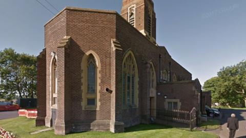 Carleton Crematorium, a round red brick church like building