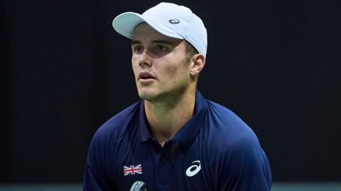 Arthur Fery waits to receive serve