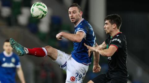 Matthew Fitzpatrick and Cameron Palmer contend for possession