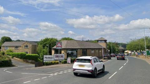 The junction of Halifax Road (A58) and Tanhouse Hill junction in Hipperholme, West Yorkshire - near Hipperholme crossroads