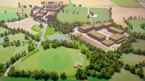 CGI aerial image of plans for film studios, with rectangular buildings surrounded by green fields