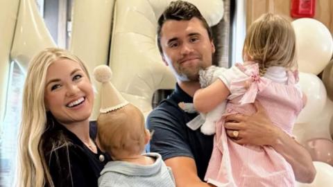 Charlie Kirk, his wife, Erika, and their two children