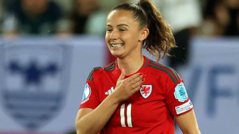 Hannah Cain celebrates scoring
