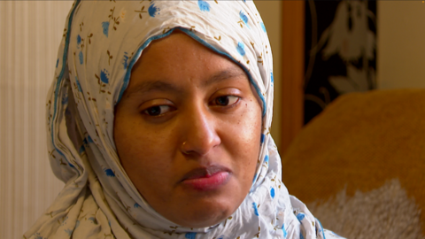 Shakila Meli wearing white headscarf with blue flowers