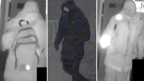 Blurry black and white CCTV. A man is pictured wearing dark clothes and carrying a rucksack on his back. 