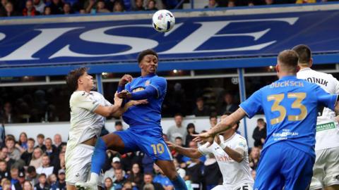 Birmingham City's Demarai Gray winning a header during their match against Swansea