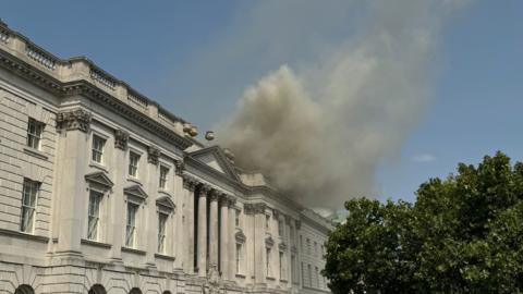 Smoke seen billowing from the roof of Somerset House