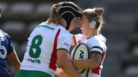 Keira Bevan celebrates her try