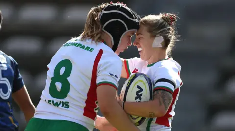 Keira Bevan celebrates her try