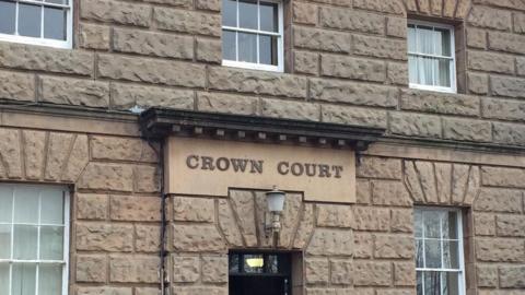 The front of the sandstone Chester Crown Court building.
