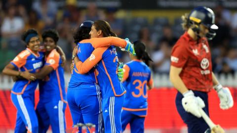 India celebrate a wicket