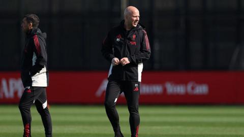 Arne Slot looks on during a training session