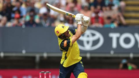 Hampshire batter Joe Weatherley looking upwards after hitting an aerial shot