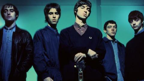 Image shows the members of Oasis.