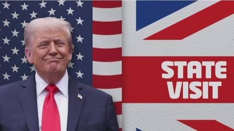 President Trump with US and UK flag behind him.