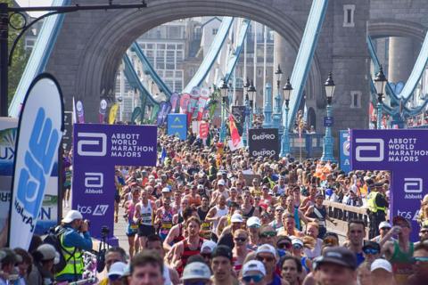Runners crossing Tower Bridge in the 2025 London Marathon