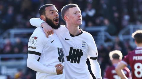 Keshi Anderson (left) celebrates his seventh goal of the season with Jay Stansfield