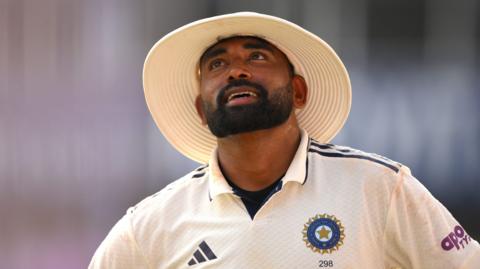 India fast bowler Mohammed Siraj looks to the skies