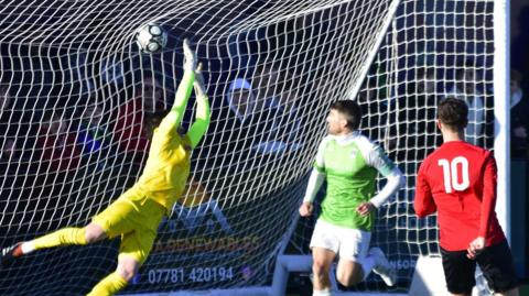 Guernsey FC score a goal