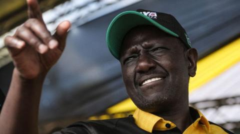 Kenya's Deputy President William Ruto reacts during his first rally after being officially nominated as a presidential candidate.