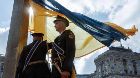 The servicemen of Ukrainian Guard of Honor raise the National Flag in downtown Kyiv, Ukraine, 23 August 2025.
