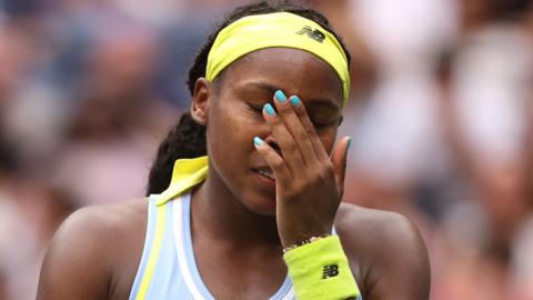 Coco Gauff reacts during her US Open defeat by Emma Navarro