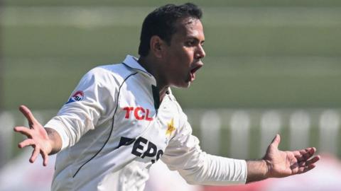 Pakistan bowler Noman Ali celebrates taking a wicket